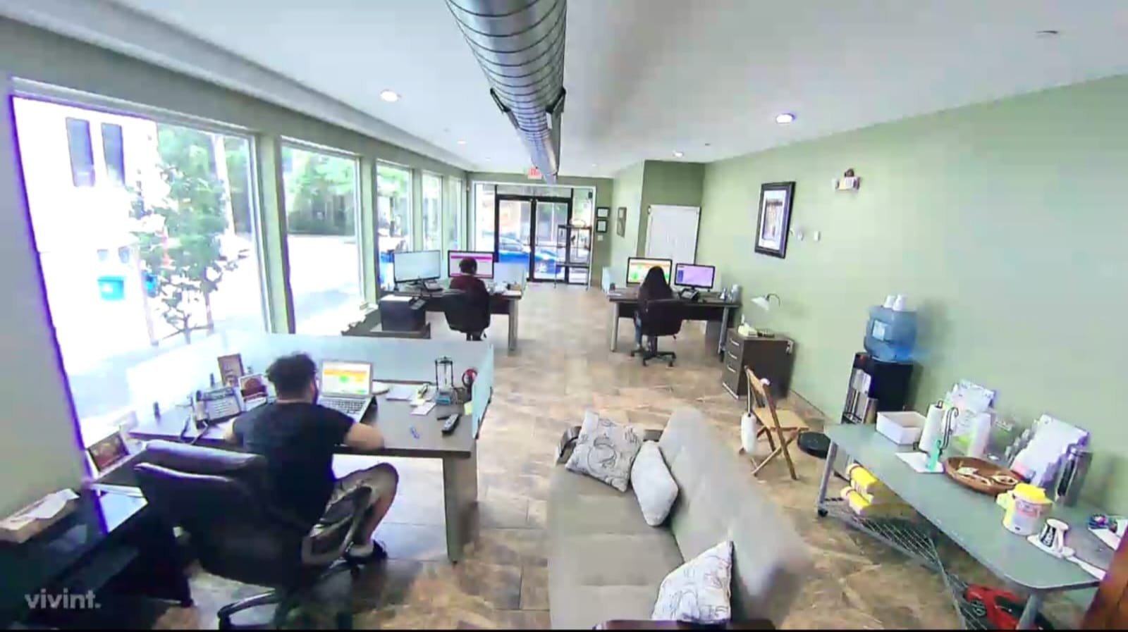 Office interior with staff working at desks